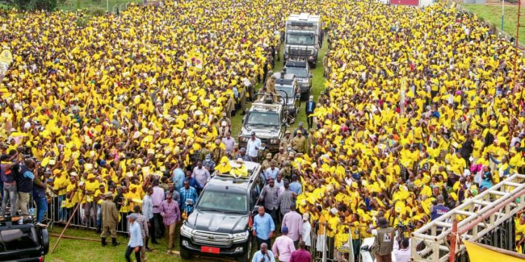 Museveni and NRM Supporters Brave Heavy Rain in Wakiso, Challenging Bobi Wine as Ghanaian King Joins Nansana Rally!