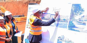 At New UBOS Office Ground Breaking  Ceremony, Finance Minister Musasizi  Predicts Dr. Chris Mukiza’s Long Stay,  Tells Why Cabinet is Happy with Him