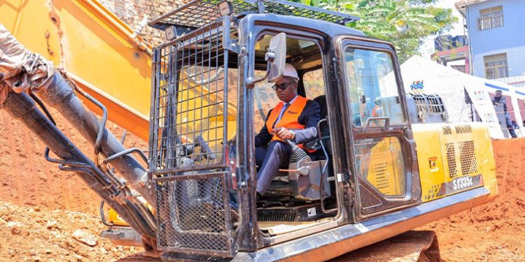 At New UBOS Office Ground Breaking  Ceremony, Finance Minister Musasizi  Predicts Dr. Chris Mukiza’s Long Stay,  Tells Why Cabinet is Happy with Him