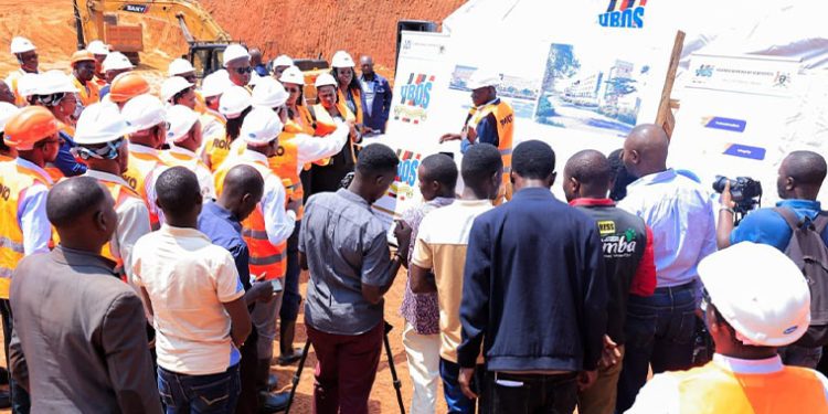At New UBOS Office Ground Breaking  Ceremony, Finance Minister Musasizi  Predicts Dr. Chris Mukiza’s Long Stay,  Tells Why Cabinet is Happy with Him